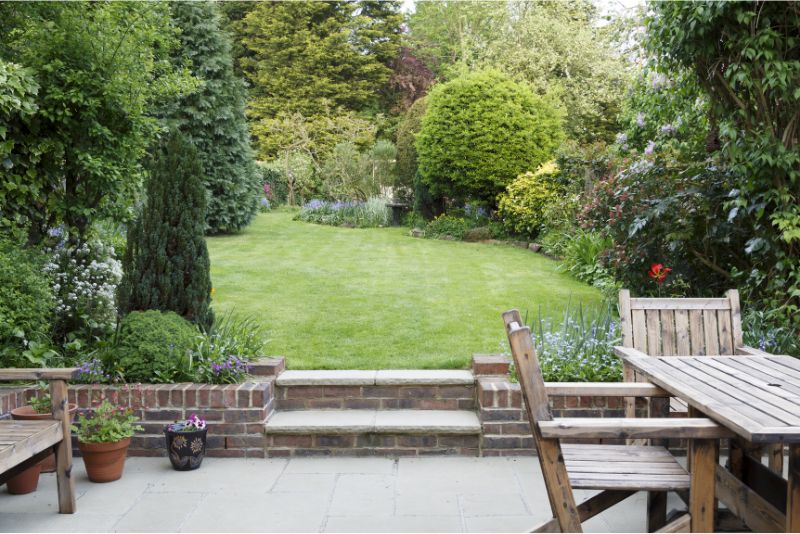 a photo of a concrete patio with seats